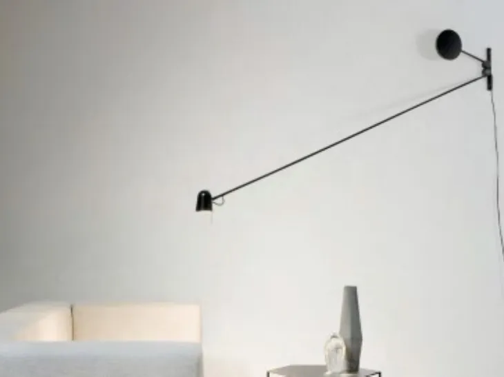 Lampada da parete orientabile a piacere in acciaio con testa in alluminio Counterbalance di Luceplan