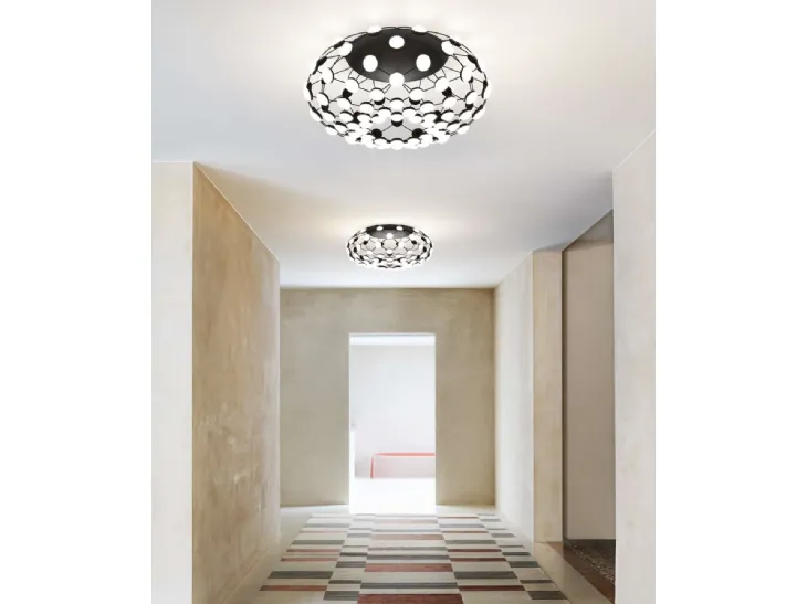 Lampada da parete con struttura in acciaio con lenti in policarbonato Mesh Plafone di Luceplan