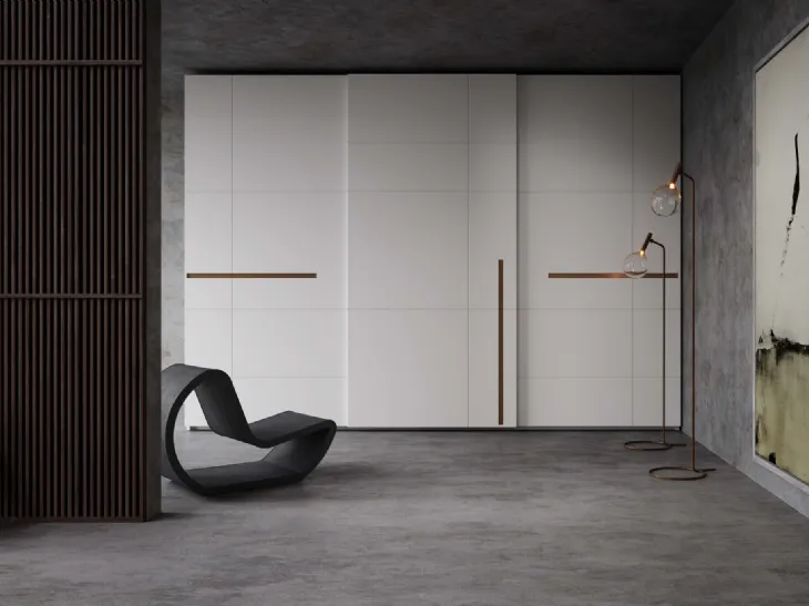 Armadio laccato bianco con inserti in bronzo Prestige 3 ante scorrevoli di Voltan