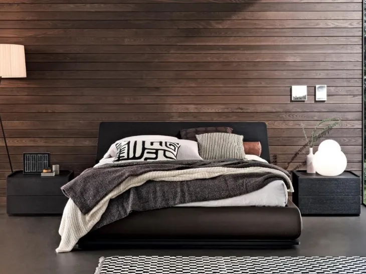 Letto con testiera in legno e giroletto contenitore rivestito in pelle Charme di Giellesse